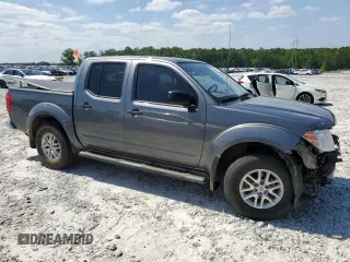 2019 Nissan Frontier SV z VIN 1N6DD0EV7KN723521, wystawiony jako Copart lot #54879745 z przebiegiem 70 856 mil mil oraz Szkoda całkowita • Salvage title. Historia ofert i sprzedaży dostępna na DreamBid. Obrazek 4.