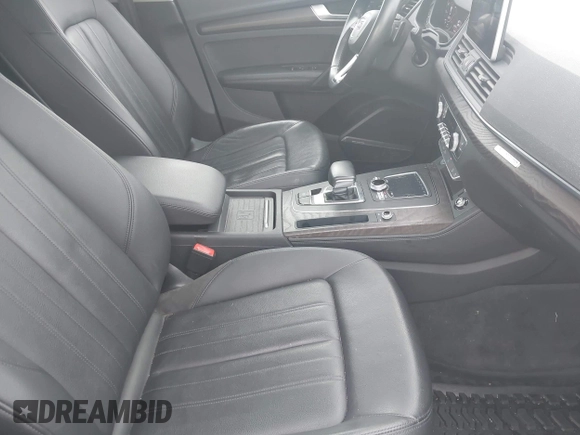 2019 Audi Q5 Premium Plus z VIN WA1BNAFY4K2073225, wystawiony jako IAAI lot #42458236 z przebiegiem 104 706 mil mil oraz . Historia ofert i sprzedaży dostępna na DreamBid. Obrazek 5.