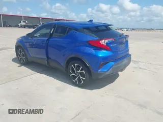 2018 Toyota C-HR XLE z VIN NMTKHMBX5JR057407, wystawiony jako IAAI lot #42363412 z przebiegiem 155 673 mil mil oraz . Historia ofert i sprzedaży dostępna na DreamBid. Obrazek 3.