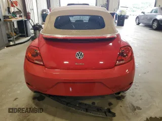 2015 Volkswagen Beetle with VIN 3VW7S7AT1FM822318, listed as a Copart auction lot 71398644 with 73,421 mi miles and Salvage Title. Bid and sale history available at DreamBid. Image 6.