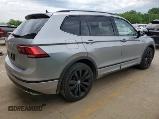 2021 Volkswagen Tiguan SE z VIN 3VV3B7AX8MM117650, wystawiony jako Copart lot #57075485 z przebiegiem 51 309 mil mil oraz Szkoda całkowita • Salvage title. Historia ofert i sprzedaży dostępna na DreamBid. Obrazek 3.