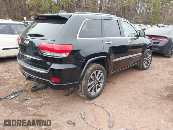 2017 Jeep Grand Cherokee Overland z VIN 1C4RJECG4HC878258, wystawiony jako IAAI lot #41361352 z przebiegiem 137 574 mil mil oraz . Historia ofert i sprzedaży dostępna na DreamBid. Obrazek 4.