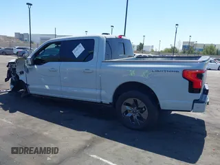 2023 Ford F-150 Lightning Pro with VIN 1FTVW1EV6PWG58783, listed as a IAAI auction lot 41965739 with Not Provided miles and . Bid and sale history available at DreamBid. Image 14.