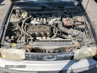 1992 Ford Escort z VIN 1FAPP11JXNW156984, wystawiony jako Copart lot #63462264 z przebiegiem 37 774 mil mil oraz Szkoda całkowita • Salvage title. Historia ofert i sprzedaży dostępna na DreamBid. Obrazek 11.