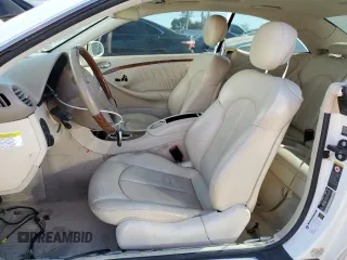 2009 Mercedes-Benz CLK-Class 3.5L with VIN WDBTJ56H39F264312, listed as a Copart auction lot 76835154 with 125,624 mi miles and Salvage Title. Bid and sale history available at carsss.com. Image 7.