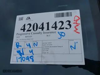 2023 Rivian R1T Launch Edition with VIN 7FCTGAAL3PN017339, listed as a IAAI auction lot 42041423 with 15,098 mi miles. Bid and sale history available at carsss.com. Image 20.