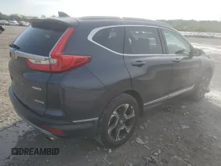 2018 Honda CR-V Touring z VIN 7FARW2H94JE077885, wystawiony jako Copart lot #55451345 z przebiegiem 133 964 mil mil oraz Szkoda całkowita • Salvage title. Historia ofert i sprzedaży dostępna na DreamBid. Obrazek 3.