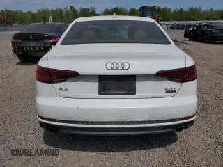 2018 Audi A4 Premium с VIN WAUDNAF41JA096443, выставлен на аукционе Copart как лот 55079265 с пробегом 125 294 миль миль и Списание • Salvage title. История ставок и продаж доступна на DreamBid. Изображение 6.