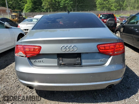 2012 Audi A8 z VIN WAURVAFDXCN001167, wystawiony jako Copart lot #57227105 z przebiegiem 154 409 mil mil oraz Szkoda całkowita • Salvage title. Historia ofert i sprzedaży dostępna na DreamBid. Obrazek 6.