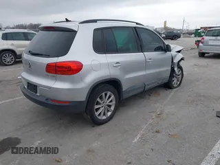 2015 Volkswagen Tiguan SE with VIN WVGAV7AX5FW592216, listed as a IAAI auction lot 41401020 with 110,726 mi miles and . Bid and sale history available at DreamBid. Image 4.