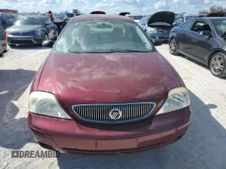 2004 Mercury Sable GS z VIN 1MEFM50U44G614186, wystawiony jako Copart lot #77822494 z przebiegiem 59 829 mil mil oraz Szkoda całkowita • Salvage title. Historia ofert i sprzedaży dostępna na DreamBid. Obrazek 5.
