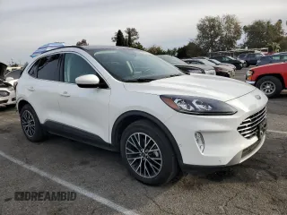 2022 Ford Escape Titanium Plug-In Hybrid с VIN 1FMCU0LZ8NUB45858, выставлен на аукционе Copart как лот 84727544 с пробегом 8 612 миль миль и Списание • Salvage title. История ставок и продаж доступна на DreamBid. Изображение 4.