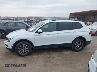 2021 Volkswagen Tiguan S z VIN 3VV0B7AX5MM071469, wystawiony jako IAAI lot #41716496 z przebiegiem 38 213 mil mil oraz . Historia ofert i sprzedaży dostępna na DreamBid. Obrazek 14.