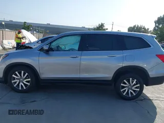 2021 Honda Pilot EX with VIN 5FNYF5H37MB014384, listed as a IAAI auction lot 42412500 with 36,934 mi miles and . Bid and sale history available at DreamBid. Image 15.