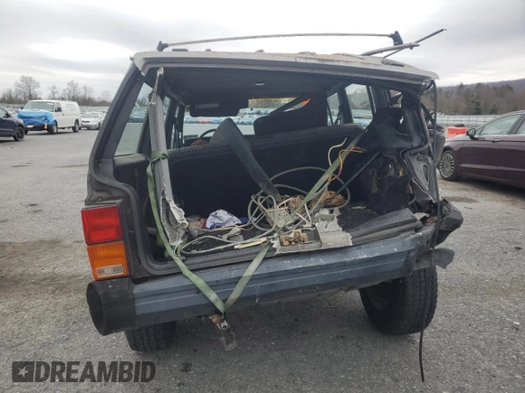 1987 Jeep Cherokee z VIN 1JCMR7819HT151523, wystawiony jako Copart lot #51586765 z przebiegiem 113 668 mil mil oraz Szkoda całkowita • Salvage title. Historia ofert i sprzedaży dostępna na DreamBid. Obrazek 6.