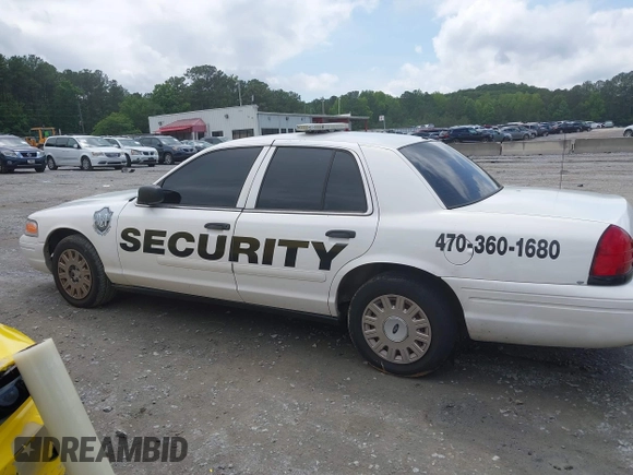 2005 Ford Police Interceptor with VIN 2FAHP71W95X137155, listed as a IAAI auction lot 42375960 with 117,866 mi miles and . Bid and sale history available at DreamBid. Image 13.