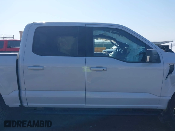 2022 Ford F-150 XL z VIN 1FTEW1EP7NKD78585, wystawiony jako IAAI lot #40264151 z przebiegiem Nie podano mil oraz . Historia ofert i sprzedaży dostępna na DreamBid. Obrazek 13.