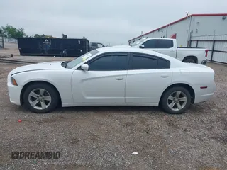 2014 Dodge Charger SE with VIN 2C3CDXBG5EH277920, listed as a IAAI auction lot 42109354 with 146,615 mi miles and . Bid and sale history available at carsss.com. Image 15.