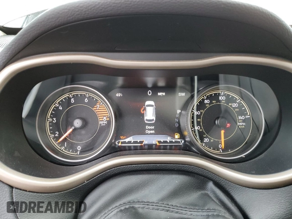 2017 Jeep Cherokee Limited with VIN 1C4PJMDSXHW633757, listed as a Copart auction lot 52146435 with 104,066 mi miles and Salvage Title. Bid and sale history available at DreamBid. Image 9.