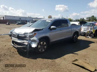 2018 Honda Ridgeline RTL with VIN 5FPYK3F59JB014331, listed as a Copart auction lot 68506934 with 89,047 mi miles and Salvage title. Bid and sale history available at DreamBid. Image 1.