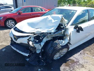 2019 Toyota Camry LE with VIN 4T1B11HK2KU187475, listed as a IAAI auction lot 42192293 with 44,413 mi miles and . Bid and sale history available at DreamBid. Image 6.