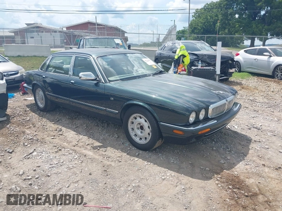 1999 Jaguar XJ with VIN SAJKD6048XC869099, listed as a IAAI auction lot 42761055 with 124,326 mi miles and . Bid and sale history available at DreamBid. Image 1.