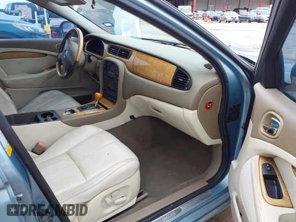 2003 Jaguar S-Type with VIN SAJEA01U33HM70079, listed as a IAAI auction lot 41939388 with 147,975 mi miles and . Bid and sale history available at DreamBid. Image 5.