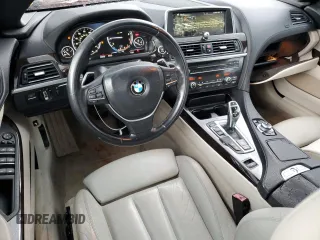 2014 BMW 6 Series 640i xDrive z VIN WBAYP5C58EDZ28025, wystawiony jako Copart lot #60070315 z przebiegiem 92 038 mil mil oraz Czysty tytuł • Clean title. Historia ofert i sprzedaży dostępna na DreamBid. Obrazek 8.