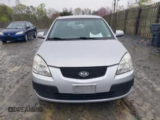 2009 Kia Rio SX with VIN KNADE223596538965, listed as a IAAI auction lot 42029409 with 143,794 mi miles. Bid and sale history available at carsss.com. Image 6.