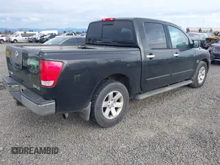 2004 Nissan Titan LE with VIN 1N6AA07A24N549589, listed as a IAAI auction lot 41750807 with 218,118 mi miles and . Bid and sale history available at DreamBid. Image 4.