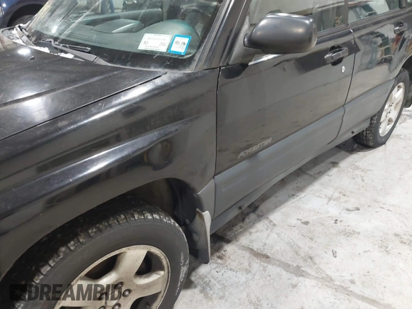 1998 Subaru Forester L with VIN JF1SF6353WH776091, listed as a IAAI auction lot 41573799 with 170,851 mi miles. Bid and sale history available at carsss.com. Image 12.