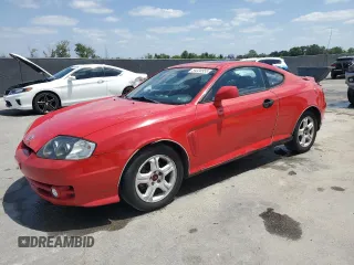 2003 Hyundai Tiburon GT z VIN KMHHN65F33U088538, wystawiony jako Copart lot #54320955 z przebiegiem 220 732 mil mil oraz Szkoda całkowita • Salvage title. Historia ofert i sprzedaży dostępna na DreamBid. Obrazek 1.