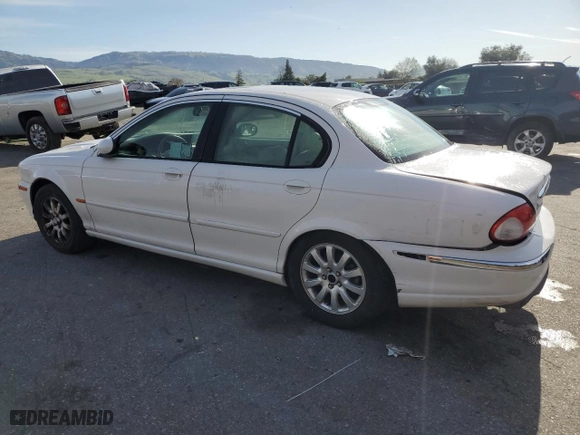 2003 Jaguar X-Type 2.5L Manual with VIN SAJEA51D53XC89023, listed as a Copart auction lot 49325475 with 148,808 mi miles and Salvage Title. Bid and sale history available at carsss.com. Image 2.