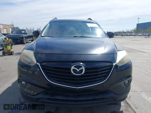 2015 Mazda CX-9 Grand Touring z VIN JM3TB2DA4F0450014, wystawiony jako IAAI lot #41692935 z przebiegiem 90 800 mil mil oraz . Historia ofert i sprzedaży dostępna na DreamBid. Obrazek 12.