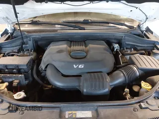 2015 Jeep Grand Cherokee Laredo with VIN 1C4RJFAG4FC660665, listed as a IAAI auction lot 41529532 with 124,099 mi miles. Bid and sale history available at carsss.com. Image 10.