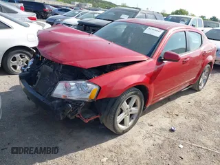 2013 Dodge Avenger SXT with VIN 1C3CDZCB1DN682290, listed as a IAAI auction lot 41964841 with 156,511 mi miles and . Bid and sale history available at carsss.com. Image 2.