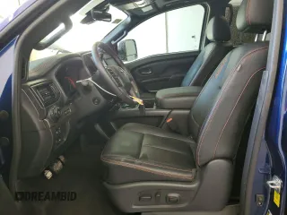 2024 Nissan Titan SV with VIN 1N6AA1FB2RN104714, listed as a Copart auction lot 56576955 with 25,800 mi miles and Salvage title. Bid and sale history available at DreamBid. Image 7.