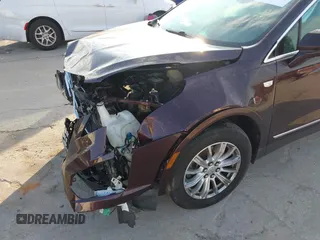 2018 Cadillac XT5 FWD with VIN 1GYKNARS6JZ179706, listed as a IAAI auction lot 41195570 with 80,676 mi miles. Bid and sale history available at carsss.com. Image 19.