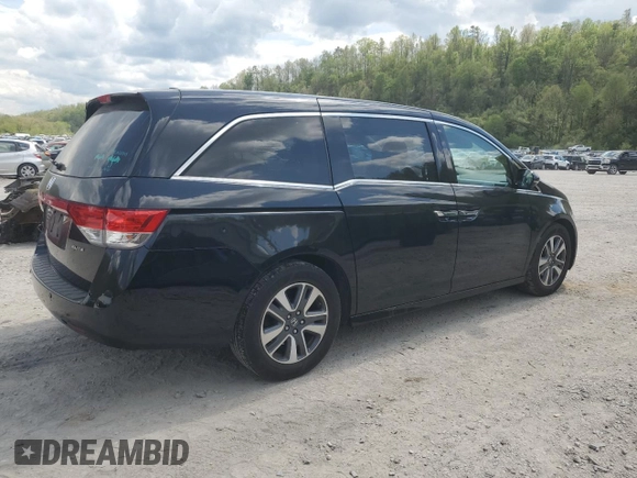 2016 Honda Odyssey Touring Elite with VIN 5FNRL5H97GB038917, listed as a Copart auction lot 54479375 with 165,432 mi miles and Salvage Title. Bid and sale history available at DreamBid. Image 3.