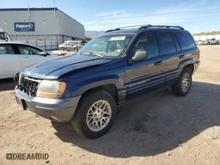 2004 Jeep Grand Cherokee Limited with VIN 1J4GW58S54C166433, listed as a Copart auction lot 71649454 with 174,603 mi miles and Salvage Title. Bid and sale history available at carsss.com. Image 1.