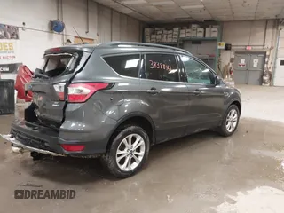 2017 Ford Escape SE with VIN 1FMCU9G9XHUB71008, listed as a IAAI auction lot 40909330 with 181,480 mi miles. Bid and sale history available at carsss.com. Image 4.