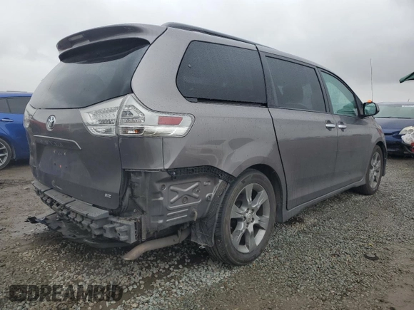 2014 Toyota Sienna SE with VIN 5TDXK3DC3ES470042, listed as a Copart auction lot 49254335 with 99,208 mi miles and Salvage Title. Bid and sale history available at DreamBid. Image 3.