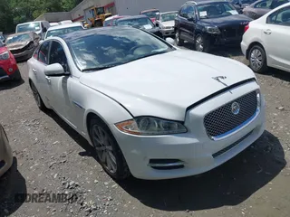 2015 Jaguar XJ with VIN SAJWA1CZ0F8V75119, listed as a IAAI auction lot 42248663 with 94,060 mi miles and . Bid and sale history available at DreamBid. Image 1.
