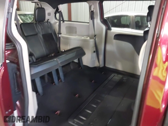 2018 Dodge Grand Caravan SXT with VIN 2C4RDGCG4JR297603, listed as a IAAI auction lot 42144645 with 114,098 mi miles and . Bid and sale history available at DreamBid. Image 8.