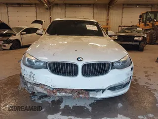 2016 BMW 3 Series GT 328i xDrive with VIN WBA8Z5C54GG500965, listed as a IAAI auction lot 41254000 with 115,672 mi miles. Bid and sale history available at carsss.com. Image 12.