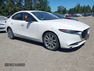 2021 Mazda 3 with VIN JM1BPBDL6M1340029, listed as a IAAI auction lot 42461850 with 79,798 mi miles and . Bid and sale history available at DreamBid. Image 1.