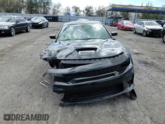 2020 Dodge Charger Scat Pack Widebody z VIN 2C3CDXGJ5LH232350, wystawiony jako Copart lot #47999665 z przebiegiem 37 599 mil mil oraz Szkoda całkowita • Salvage title. Historia ofert i sprzedaży dostępna na DreamBid. Obrazek 11.