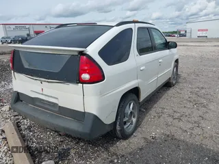 2002 Pontiac Aztek z VIN 3G7DA03E52S579681, wystawiony jako IAAI lot #42165625 z przebiegiem Nie podano mil oraz . Historia ofert i sprzedaży dostępna na DreamBid. Obrazek 4.