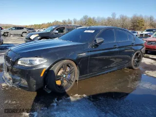 2015 BMW M5 with VIN WBSFV9C58FD594659, listed as a Copart auction lot 88617935 with 58,067 mi miles and Salvage Title. Bid and sale history available at carsss.com. Image 1.