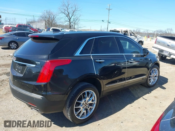 2017 Cadillac XT5 Premium Luxury FWD z VIN 1GYKNCRS8HZ127001, wystawiony jako IAAI lot #41698197 z przebiegiem 120 978 mil mil oraz . Historia ofert i sprzedaży dostępna na DreamBid. Obrazek 13.